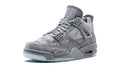 KAWS x Air Jordan 4 Retro – Rare Art Collab Sneaker with Glow-in-the-Dark Sole & Iconic XX Branding